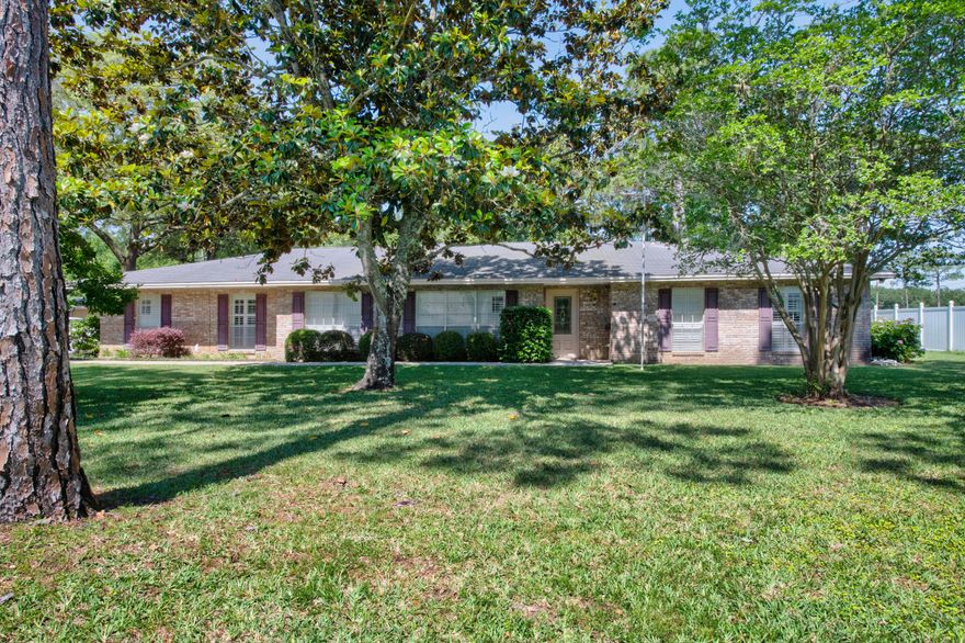 645 NE Country Club offers a rare opportunity to own a spacious home on a half-acre lot in one of Fort Walton Beach's most established and sought-after areas... all with no HOA to worry about. Set on a beautiful park-like lot surrounded by mature magnolia trees, this property delivers the kind of setting that is becoming harder to find--large, private, and full of character. Enjoy peaceful golf course views from your backyard while cooling off in your private pool, creating a space that feels like your own everyday retreat.
Inside, you'll find generous living spaces designed for flexibility and function, including a desirable mother-in-law suite ideal for multigenerational living, extended guests, a private home office, or additional income potential. The home's layout offers room to spread out, entertain, and truly make it your own.
While some areas present an opportunity for modern updates and personal touches, the home showcases timeless features, substantial square footage, and the strong foundation homeowners are looking for. The possibilities here are endless for someone wanting to blend today's style with an established home's size, location, and character.
Conveniently located near Eglin Air Force Base and Hurlburt Field, with easy access to shopping, restaurants, schools, and the white-sand beaches of the Emerald Coast, this location is ideal for military families, commuters, and anyone wanting to enjoy the best of Fort Walton Beach living. Half-acre lots, established neighborhoods, golf course views, a private pool, no Homeowner's Association, and room to grow are becoming increasingly difficult to find. Space, location, views and opportunity all come together here in a property ready for its next chapter.