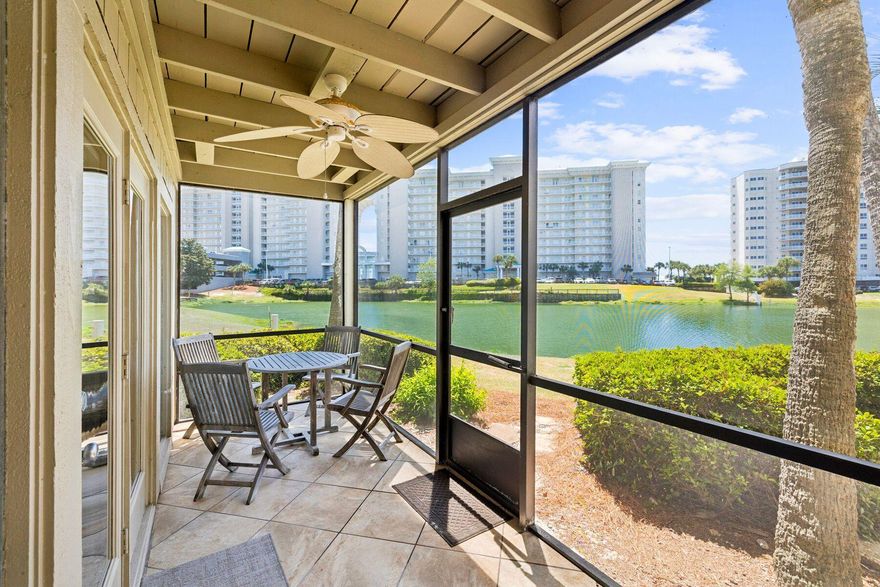 There is something especially appealing about a home that gives you water views in one direction and the beach just beyond them. Stewart Lake Cove 180 captures that ease beautifully, offering a serene lakefront setting within Seascape Resort and a location that places the best of Miramar Beach within easy reach. Positioned directly on Lake Stewart, this beautifully maintained three-bedroom, two-bath residence offers more than 1,261 square feet of thoughtfully arranged living space with two private screened balconies designed to make the most of peaceful lake views and glowing sunset skies. Inside, the interiors feel bright and relaxed with a clean coastal aesthetic, granite countertops, tile flooring in the kitchen and baths, plantation shutters and generous storage throughout. The floor plan is both practical and inviting, with one bedroom and a full bath on the main level and two additional bedrooms upstairs connected by a convenient Jack-and-Jill bath. Whether used as a primary residence, second home or investment property, the layout easily accommodates family and guests. Offered fully furnished and never rented, the home presents a rare turnkey opportunity in one of the area's most established resort settings. Mornings begin with coffee on the balcony overlooking the lake. Evenings end with sunset colors reflecting across the water. Just beyond the residence, a scenic boardwalk stretches over Lake Stewart toward the sugar-white sand, creating a picturesque walk to the beach. The neighborhood pool is less than a minute away, and parking directly in front of the unit makes arrivals and departures refreshingly simple. Set within gated Seascape Resort, owners enjoy access to more than 2,000 feet of private beach, over 500 acres of lakes and manicured grounds, championship golf, multiple pools, tennis and pickleball courts and miles of walking and biking trails. Dining, shopping and entertainment at Seascape Towne Centre are also just moments away. Comfortable, well-appointed and wonderfully positioned, this lakefront retreat offers an effortless way to enjoy coastal living in the heart of Miramar Beach.