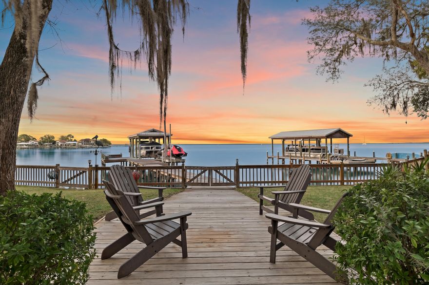 At the mouth of Buck Bayou on Choctawhatchee Bay, this beautifully renovated Santa Rosa Beach bayfront home offers the rare combination of deep-water boating, coastal single level design, and a peaceful waterfront setting just minutes from the beaches of 30A and the amenities of SandestinÃ‚Â®.
Situated on water frontage with approximately 6' of water depth much of the year, the property features a private dock with boat lift, 2 jet ski lifts, creating an ideal setup for boating, fishing, paddleboarding, and sunset cruising on Choctawhatchee Bay. 
Inside, the home was extensively renovated with a full interior transformation that blends coastal elegance with thoughtful craftsmanship. Reclaimed wood flooring sourced from a Kentucky distillery flows throughout, complemented by custom trim, crow molding, and beautifully updated kitchens and baths. 
The open living area captures stunning bay views through oversized windows, anchored by a fireplace with pecky cypress mantle and a custom wet bar designed for entertaining. The chef's kitchen features granite countertops, stainless appliances, custom cabinetry, and a reclaimed hickory island top, creating a warm and inviting gathering space overlooking the water. 
The primary suite is a retreat in it's self with sitting area, view, gas fireplace and stunning ensuite bath and all bedrooms feature custom closet systems. The updated bathrooms with Carrera marble counters, and upgraded lighting and fixtures, offer comfort and style throughout the home. 
Major system upgrades throughout provide peace of mind, including a variable-speed HVAC system, spray-foam insulation for energy efficiency, whole-house water filtration, updated electrical service with surge protection, and natural gas service with tankless hot water. 
Outdoor living is the best! A spacious backyard shaded by mature oaks leads to the waterfront deck and dock, creating a private setting to enjoy sunrises/sunsets over the bay, boating adventures, and precious moments watching dolphins and coastal wildlife.
With its tranquil waterfront setting, and the home's location, it is perfect for enjoying the beach life:
" 3 miles to Grand Boulevard and grocery shopping
" 3.5 miles to Sandestin Golf & Beach Resort® golf, tennis, and marina
" 2.5 miles to Sacred Heart Hospital
" 4.8 miles to Topsail Hill Preserve State Park beaches and trails
Offering deep-water access, extensive renovations, and a prime Santa Rosa Beach bayfront location, 285 Turquoise Beach is a rare opportunity to enjoy the best of Emerald Coast waterfront living.