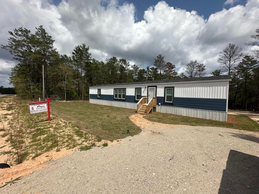 Have you been looking for an affordable new home within an hour of the Gulf Coast and the world's most beautiful beaches? Well, look no further, this beautiful, brand-new 3-bedroom 2-bath manufactured home might be just what you are looking for. Complete with all-new Whirlpool appliances, HVAC, and a water heater, this home is move-in ready. An added bonus is that the seller is willing to offer owner financing (with the right down payment and terms). Sitting on over 0.6 acres, this property offers potential for the investor, with a spacious backyard that has already been surveyed and shows where it can be split into three individual lots. So, whether you are looking for a forever home or an investment opportunity, come check this out and see if this property is right for you.