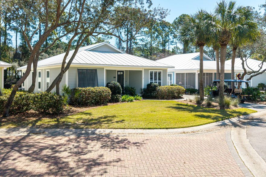 Updated beach cottage in the non-rental community of Crystal Lake within the Sandestin Golf & Beach Resort. This stunning beach home features three bedrooms, and a bonus space that can serve as an office or study. The kitchen updates include stainless steel appliances, with a standout GAS STOVE! Elegant countertops, modern fixtures, undermount lighting and island (moveable) Utility closet with washer, dryer (included) and pantry storage. Luxury vinyl flooring throughout as well as crown molding and elegant plantation shutters. Open living area features custom-built shelving with storage. The primary suite, includes an ensuite bathroom and walk-in closet and access to the spacious screened-in back porch.  Highly sought-after carport with large storage building and Golf Cart included! Landscaping and Cable included in the HOA fees. HVAC system and Water Heater replaced in 2021-
