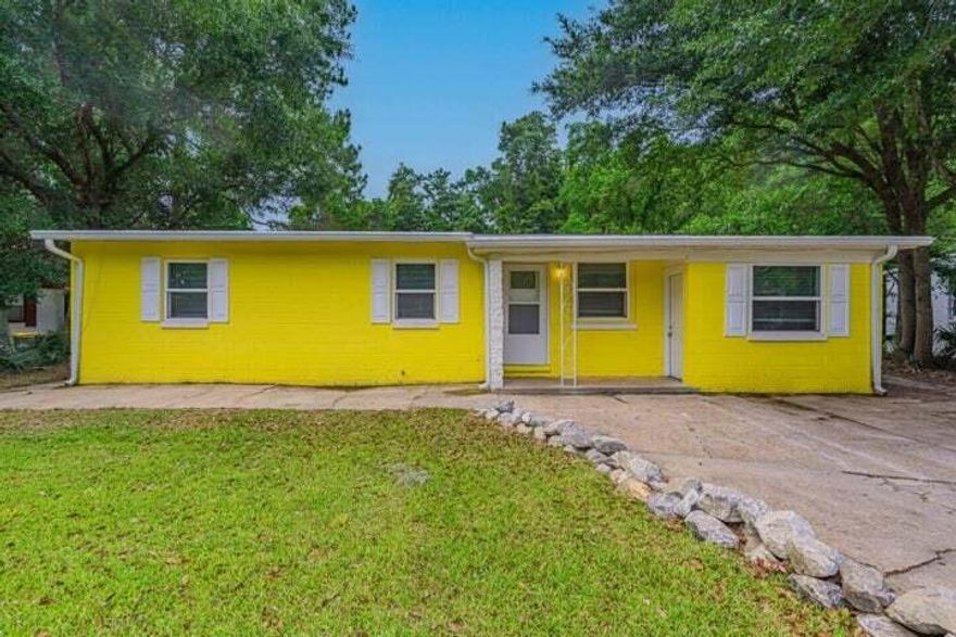 Bright and pretty as a buttercup on the outside and neat and clean on the inside.  The seller has prepared this delightful Florida cottage to move-in ready condition for a new buyer Come and make this your retirement home, first time home or investment opportunity - many options here.  
Fresh neutral paint, new LVP flooring, new windows, HVAC 2024,, new kitchen cabinets and countertops and bight white appliances too.  The central location puts you minutes to the military bases, the pretty white beach of our Gulf Coast and restaurants.  The back yard is fully fenced and a great area for play, pets  and gatherings with friends.  Ranger St is a no through street with minimal traffic..  Stop by and take a look at this charming cottage and enjoy the Florida lifestyle. Through the kitchen is the den or 4th bedroom/home school room. The central location puts you minutes to the military bases, the pretty white beach of our Gulf Coast and restaurants/craft room with its own exterior door for private entry. A convenient half bath is attached to this room.