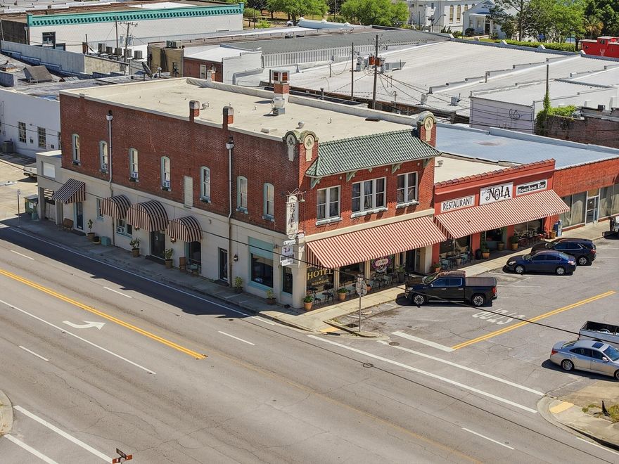 Hotel DeFuniak | Café Nola | Bourbon Street Lounge
A Crown Jewel of Northwest Florida
An extraordinary opportunity to own one of the most iconic hospitality properties in DeFuniak Springs. The renowned Hotel DeFuniak, along with Café Nola and the Bourbon Street Lounge, offers a fully restored and beautifully furnished 12-room boutique hotel, complete with restaurant, bar, and package liquor store--all in the heart of the historic downtown district.
Originally constructed in 1920 as a Masonic lodge, this stately property has been meticulously transformed into one of Florida's most charming and romantic historic hotels, A restoration was done in 2017.  A 4COP liquor license that allows 
 alcohol sales on premises & also allows carry out sales is included in the sale Recognized for excellence, the property received Tripadvisor's prestigious Seal of Excellence in 2012 and has earned a reputation as one of Florida's Top Ten Bed & Breakfast Inns.
Ideally located in the Victorian village setting of historic downtown DeFuniak Springs, this thriving destination benefits from strong tourism, local events, and its proximity--just 30 minutes--to the world-famous white sand beaches of the Emerald Coast.
This New York-style vintage boutique hotel offers:
" 12 beautifully appointed guest rooms 
" Established restaurant and bar (Café Nola & Bourbon Street Lounge) 
" Package liquor store for additional revenue 
" Turnkey operation with strong brand identity 
" Prime location in a growing market with a rich cultural      heritage 
Whether you're an investor or an owner-operator seeking a signature property, this is truly a once-in-a-lifetime opportunity to own a landmark destination with proven appeal and unlimited upside.Call today to schedule your private tour of this exceptional property.