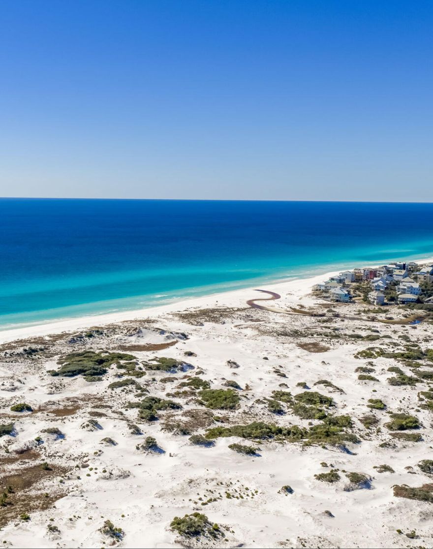 Stunning Home Right on the sand with gorgeous Gulf Views in Grayton Beach!!! This exceptional 7-bedroom coastal retreat also features 2 bonus rooms, offering space and flexibility for large gatherings. Enjoy a large private pool, outdoor kitchen, private elevator, and parking for up to 8 cars--rare for a true beachfront home. Designed for luxury living, the property is turn key, features a dedicated bunk room, and three expansive balconies capturing breathtaking sunsets and stars on clear nights. Located less than 350' from The Red Bar and Chiringo, with a boat launch to place in a kayak or paddle board into Western Lake at the end of the street. Fully furnished and turnkey, this is effortless Gulf-front living at its finest.