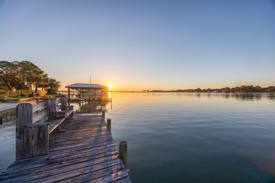 Is there a 4-bedroom waterfront home in Fort Walton Beach with deep water access and Gulf connectivity? 239 Beachview Dr presents a rare opportunity to own a .39-acre deep-water bayfront property with direct access to the Gulf of America via East Pass, offering exceptional potential to remodel or build new in a premier boating location.

This is a compelling opportunity for buyers, builders, and investors seeking a custom waterfront estate, a value-add redevelopment opportunity, or a high-demand short-term rental property. Short-term rentals are allowed, adding flexibility and income potential in a sought-after coastal market. Whether you choose to renovate the existing home or build new, this 4-bedroom waterfront home in Fort Walton Beach stands out as a rare opportunity to secure deep water access, an estate-sized lot, and long-term value.

Situated on Choctawhatchee Bay, 239 Beachview Dr offers a unique combination of existing livable space and long-term development potential on an estate-sized waterfront lot in a protected bayfront setting with unobstructed water views. The home features 4 bedrooms, 2 bathrooms, and 1,658 square feet, including a Florida room that can be reimagined to maximize the waterfront backdrop. The expansive .39-acre lot is the true highlight, presenting a rare bayfront offering with build-ready potential, ideal for those looking to design a custom waterfront estate or create a legacy property. Deep water access supports large vessels and sportfishing boats, with the opportunity to add a private dock tailored to your boating needs.

With direct access to the Gulf of America via East Pass, this location is well suited for offshore boating and deep-sea fishing. From your private sandy shoreline, enjoy captivating sunrises and moonrises that define extraordinary waterfront living. The setting supports a full range of water-based activities including boating, kayaking, jet skiing, paddleboarding, snorkeling, and fishing. Choctawhatchee Bay is widely recognized as a fisherman's delight, with miles of bayous and tributaries extending from the bay, offering diverse fishing environments and year-round opportunity for anglers.

Spend your days kayaking, jet skiing, boating, fishing, or snorkeling, then take your boat across the bay for an evening in Destin Harbor with waterfront dining and entertainment. The outdoor space offers a natural canvas to design your waterfront haven, whether creating a zen-inspired escape, an expansive entertaining area, or a private coastal retreat surrounded by water, wildlife, and open skies.

Deep water access properties like this rarely become available on Choctawhatchee Bay, especially with a .39-acre estate-sized footprint and this level of boating accessibility. This is a location homeowners hold onto, making opportunities to purchase here limited. 

Schedule your private showing to experience the setting, scale, and potential of this waterfront property firsthand.

All information is deemed reliable; however, accuracy should be independently verified by interested parties.