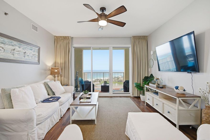 Perched on the 17th floor of Ariel Dunes II, Unit 1709 offers breathtaking, unobstructed Gulf views with panoramic vistas of emerald water and sugar-white sand. This fully furnished, turnkey condo has been extensively renovated throughout, featuring luxury vinyl plank flooring, updated white tile, modern lighting, and designer finishes. The beautifully reimagined primary bath showcases a custom oversized tiled walk-in shower, quartz countertops, updated vanity, and owner's closet. The guest bath has also been tastefully updated with quartz counters, new tub surround, and refreshed finishes. The modernized kitchen features professionally painted cabinetry, a sleek black granite composite sink, and matching black faucet for a clean coastal aesthetic. Designed for maximum rental appeal, the floor plan includes a dedicated bunk room and flexible sleeping arrangements accommodating up to 8 guests. Short-term rentals are permitted, making this an outstanding investment opportunity or personal beach retreat. Resort-style amenities include pools, fitness center, beach access, and ample parking in one of the Emerald Coast's most sought-after destinations.
