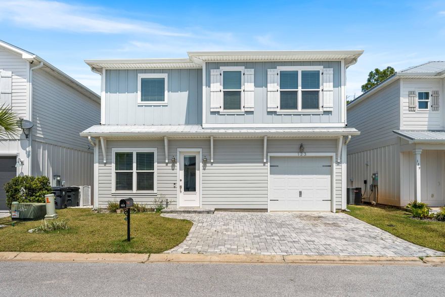 Welcome to this charming two-story home nestled in the heart of Santa Rosa Beach! Located in a quiet, dog-friendly neighborhood south of Hwy 98 with a scenic bike path and sidewalk leading to the stunning, powder-sugar sand beaches of the Emerald Coast. This beautiful 3-bedroom, 2.5-bath residence offers the perfect blend of comfort and convenience. Step inside to find sun-lit, spacious living areas filled with natural light, designed for both comfort and entertaining. The main floor welcomes you with a cozy living room, a well-equipped kitchen with stainless steel appliances, and a dining area that opens to a fenced backyard with grassy space and a deck. Relax or swim laps in your 15-foot Master Spa H2X purchased new in 2024! It's lockable for safety and enjoyable year round! Upstairs, you'll find the generous primary suite with a private bath that has a separate shower and garden tub, double sinks, and generous closet space. There are two additional bedrooms, a full bathroom, and a conveniently located laundry room.

A large closet downstairs offers plenty of extra storage, and you have a garage to pull your car into and hang up those paddleboards!  There is a Residential EV Charger in the garage.

Helen McCall Park is just over a private bridge, or head to nearby Gulf Place for more beach access, local shops, and restaurants all about a mile away.

Whether you are looking for your primary home or a secondary residence, you'll appreciate the peaceful neighborhood feel of Thompson Woods, without the short-term rentals.

Highlights at a glance-
-The Swim Spa can convey or be removed-your choice!
-Located south of Hwy 98
-Backs up to peaceful, Pt. Washington State Forest land
-Path to beach (about a mile) and local dining and shopping.
-Modern, inviting touches that have been impeccably maintained make this home move in ready.

Don't miss this rare find in Santa rosa Beach-spacious, private, and so close to everything you love about 30A!
