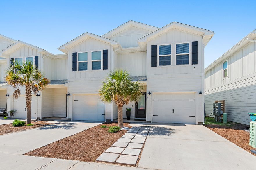 Experience coastal living at its finest in this 3-bedroom townhome. Located in the heart of Destin close to quaint cafe's and shopping. This sought after corner unit has been upgraded with custom features that are not standard.  Starting with the pavers out front as well as in the back. The primary bedroom has a beautiful closet with builtins and it flows into the ensuite spa like bathroom.  The laundry area has front loader machines with custom cabinetry.  The stairs have  a custom carpet runner.  The original wire shelving has been upgraded to wood shelving.  The pantry in the kitchen was updated to included pullout drawers and a concealed garbage drawer was added. The backsplash was added in the kitchen along with pendent lighting and dimmer switches.  The windows were all custom framed and window treatments were added.  There is built in cabinetry,  bookshelves and floating shelves in the living area and the flatscreen TV stays as well.  This home has been well thought out and the space has been meticulously managed to make the most of every room.