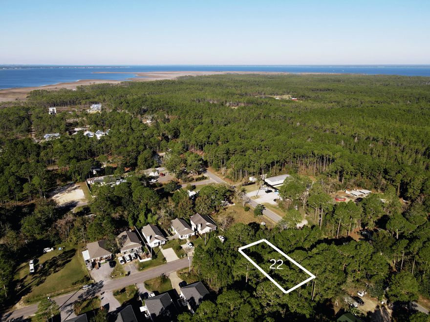 Lot 22 offers a prime homesite in North Santa Rosa Beach, an area known for its steady growth and increasing demand. Ideally located near the Choctawhatchee Bay and just a short drive to the beaches of 30A, this property provides the perfect balance of accessibility and coastal lifestyle. With nearby boat access at Cessna Landing and a variety of dining and shopping options close by, this lot is well-suited for new construction or long-term investment. For buyers seeking more space, additional adjoining land is also available.