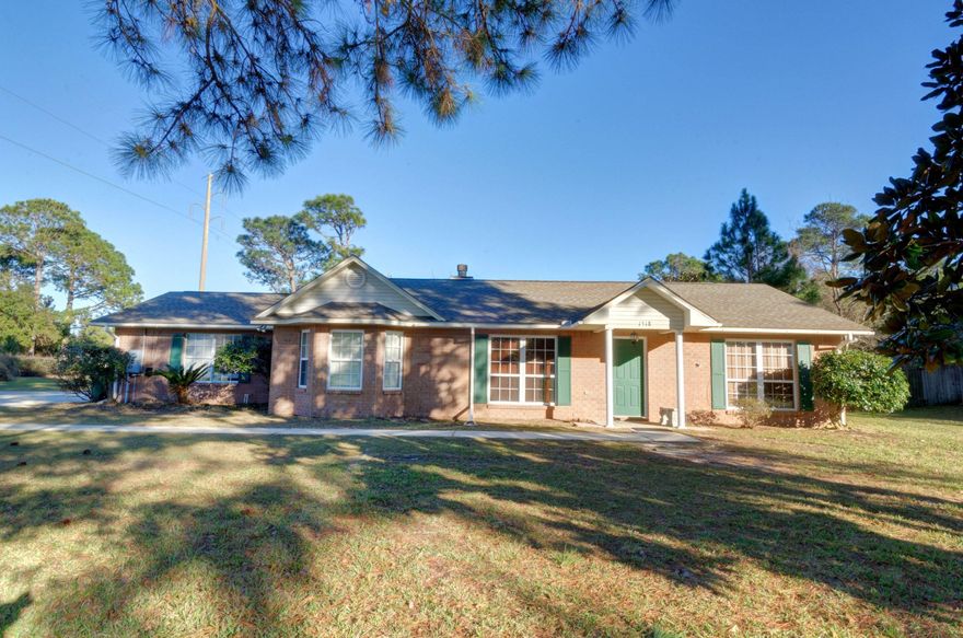 Love having your family visit but want some privacy at the same time?!? This 4BR/3BA adorable brick home is for you! Tucked away in a quiet, peaceful neighborhood with new tile installed in master bedroom and tile throughout the main house and apartment. A bonus sunroom and a covered patio that is great for entertaining. And as an added bonus for those out of town guests or extended family living with you (or maybe a man cave for him or a craft space for her) there is an apartment separate from the house. This home has BRAND NEW septic lines that will last for many years to come and beautiful landscaping that will make evenings on the patio a delight!! Light & bright! Close to shopping, and A rated schools!