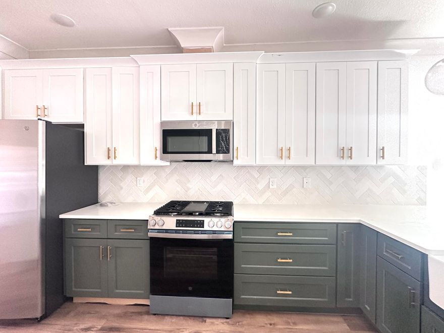 BUILDER OFFERING MAJOR INCENTIVES WITH A SPRING BONUS SALE!!! Seller will pay 2% toward buyer closing costs PLUS cover doc stamps, title, and the final survey. Fence, blinds, refrigerator, and a choice of ONE of three Bonus Packs with an acceptable offer. Builder can close in approximately 30 days or less. New construction also means peace of mind with a 10-year structural warranty, heating & cooling coverage, & a two-year door-to-door builder warranty.

This brand-new home combines a spacious open floor plan with practical design features that make everyday living easy. The main living space flows seamlessly from the kitchen to the dining and living areas, creating a comfortable layout that works just as well for hosting friends as it does for daily routines.

The kitchen is designed to be both functional and stylish, featuring quartz countertops, a farmhouse sink, stainless steel appliances, soft-close cabinetry, and a tiled backsplash. A large U-shaped layout with pantry provides plenty of prep space, storage, and room to gather. Luxury vinyl plank flooring runs throughout the main living areas, offering a clean modern look that is durable and easy to maintain.

The primary suite provides a quiet place to unwind and includes generous closet space along with a private ensuite bath. Three additional bedrooms create flexible options for guests, family members, or a home office. With two full bathrooms plus a convenient half bath for visitors, the layout offers both comfort and privacy for daily life.

Outside, the home features a durable brick and Hardie board exterior that delivers classic curb appeal and low-maintenance longevity. The fully fenced backyard includes a sprinkler system and provides space for pets, play, or outdoor gatherings. Professional landscaping and a two-car garage round out the exterior features.

One of the standout advantages of this home is that several upgrades often considered extras are already included, such as a refrigerator, window blinds, and privacy fencing. That means when construction is complete, the home will be truly move-in ready. With anticipated completion in late March, buyers have the rare opportunity to secure a brand-new home without the long construction wait.

Spring Bonus Sale Options....With an acceptable offer; choose ONE of three Bonus Packs. Option One: Blackstone Grill/Yeti Haul Cooler/Corn hole Boards/$100 gift card. Option Two: GE Top Load HE Washer & Dryer. Option Three:$1200 Any Bucks to use with a rate  buy down or any lender allowables.