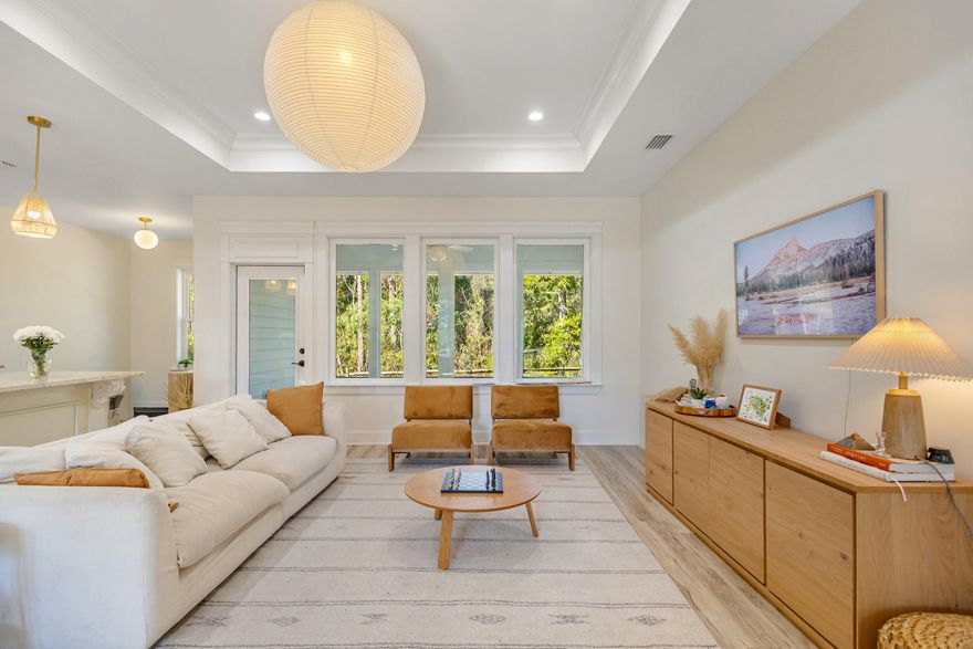 A rare find - privacy by the beach with no HOA, offered fully furnished and just a 5-minute walk to the beach. Inside, 10-foot ceilings create an open feel, along with a bright sunroom.

The spacious yard offers room to create your own outdoor space, including the option to add a pool. About two-thirds of the lot is designated as a retention area, providing added privacy and a natural buffer - something uncommon this close to the Gulf.

Ideal as a primary home, second home, or investment, this property is a unique opportunity near the beach.