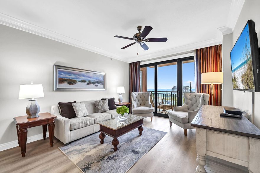Positioned in one of the most desirable locations within the iconic Emerald Grande at HarborWalk Village, this exceptional 3-bedroom, 3-bath residence offers a rare advantage that sets it apart from every other unit currently on the market. Located on the highly sought-after Grand Vista level, this residence is the very first unit off the elevator, providing unmatched convenience and effortless access to the resort's premier amenities without the extended wait for elevators or long interior walks.

The exclusive Grand Vista level offers direct access to the resort-style pool deck, sports bar, restaurant, concierge, and gift shop -- creating a true luxury resort experience right outside your door. Inside, the residence has been freshly painted and updated with new wood flooring, delivering a clean, modern coastal aesthetic ready for immediate enjoyment or rental income.

Enjoy two private balconies overlooking the stunning waters of Crab Island, where you can take in the vibrant harbor activity, sunsets, and coastal views that make Destin one of Florida's most celebrated destinations.

Offered fully turnkey, this property presents an outstanding investment opportunity, second home, or primary residence in the heart of HarborWalk Village -- just steps from dining, entertainment, boating, fishing, and waterfront attractions.

Adding even more long-term value, Emerald Grande is currently undergoing a significant exterior enhancement project including a new roof and full exterior repainting, further elevating the appeal and prestige of this landmark waterfront resort.