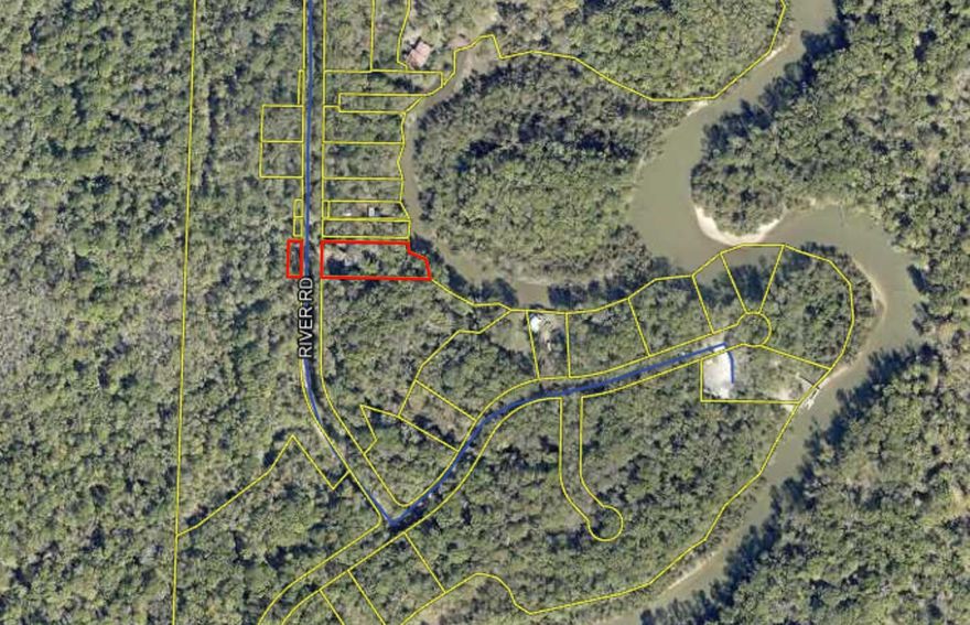 Nestled on 1 acre along the Choctawhatchee River in Walton County, this 2-bedroom, 1-bath cabin offers an old Florida tropical feel and a nature lover's paradise. Fully furnished with an open front porch, covered rear porch, large separate covered and partially screened patio for entertaining, dock, and new metal shed/garage, small block outbuilding. Off a winding freshly paved road surrounded by mature trees & right near a county boat ramp, freshwater springs; river eventually  leads to the Choctawhatchee Bay & Gulf of America. The lot has a small portion across the street from the gate entrance for additional parking. Approximately 50 minute drive to the beach. Buyer to perform own due diligence.