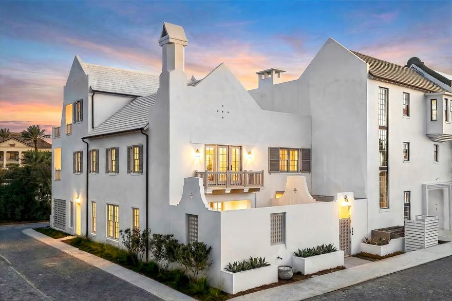 Set within one of 30A's most architecturally celebrated communities, 155 Elbow Beach Road is a masterful expression of coastal refinement. Designed and built by Brian Spence, this three-story residence offers 5,263 square feet of elevated living, where timeless Mediterranean influence meets contemporary luxury.

Comprising five bedrooms and six and a half baths, the home unfolds through a series of thoughtfully curated indoor and outdoor spaces that invite both privacy and connection. Venetian plaster finishes, designer lighting, and fully appointed furnishings establish an atmosphere of understated sophistication throughout. An in-home elevator provides seamless access across all levels, enhancing everyday ease. The heart of the residence is defined by gracious living spaces and a chef's kitchen outfitted with Sub-Zero and Wolf appliances, where culinary artistry and social gatherings unfold effortlessly. The primary suite is a private sanctuary, featuring a spa-inspired bath with dual steam showers and refined detailing.

Outdoor living is elevated to an art form. A heated private pool with hot tub, fountains, and fireplace creates a resort-style courtyard, complemented by a Wolf grill and inviting lounge spaces designed for evenings under the stars. An outdoor shower and layered terraces further enhance the coastal lifestyle.

From the third floor, breathtaking Gulf views unfold--framing sunsets and sea breezes that define life along the shoreline. Garages with ceilings designed to accommodate vehicle lifts offer exceptional flexibility for additional car storage, blending practicality with thoughtful design.

Fully furnished and impeccably appointed, 155 Elbow Beach Road presents a rare opportunity to experience Alys Beach living at its most refined--where architecture, craftsmanship, and lifestyle converge in remarkable harmony.