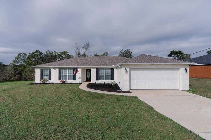 Welcome to 460 Jillian Drive--where comfort, updates, and location come together in the heart of South Crestview. This beautifully refreshed 4-Bed, 2-Bath whitewashed brick home is truly move-in ready and packed with upgrades. Step inside to a spacious, open living area featuring soaring vaulted ceilings and plenty of room to relax or entertain. The home flows seamlessly into an eat-in kitchen complete with a breakfast nook, center island, pantry, and abundant cabinet space--perfect for everyday living and hosting. A formal dining room just off the kitchen adds flexibility for gatherings or a dedicated workspace. The primary suite is generously sized and privately positioned overlooking the backyard, offering a peaceful retreat. The en-suite bath features a double vanity, garden tub, separate shower, and walk-in closet. Enjoy the outdoors year-round from your screened-in back deck, which overlooks a wooded backdrop--providing both privacy and a serene setting. Recent upgrades include: Roof (2019); HVAC (2024); Water Heater (2020). Conveniently located with easy access to 7th Special Forces Group, Duke Field, and Eglin AFB, this home is ideal for both homeowners and investors alike.