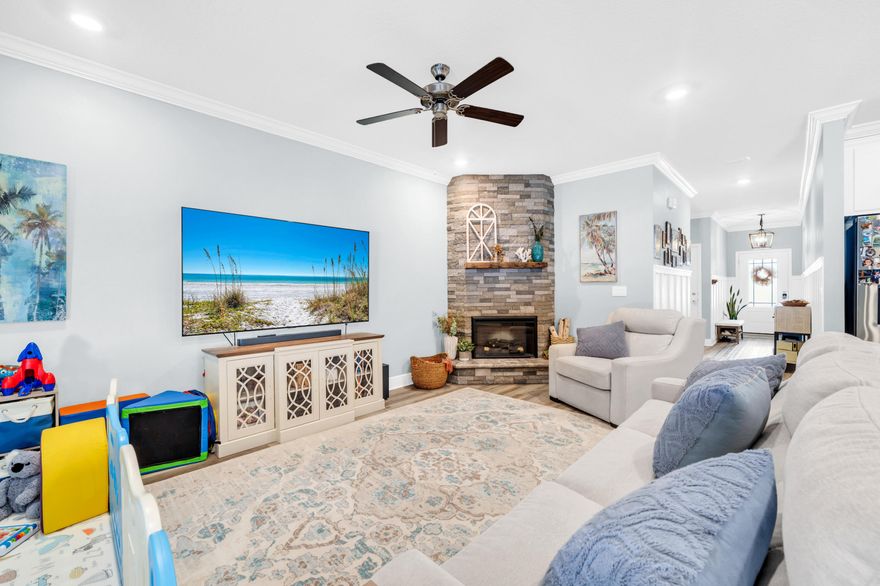 Welcome home to this meticulously upgraded residence that offers the ultimate flexibility as a primary home, long-term investment, or short-term vacation rental (projections over $60k annually!). This home goes far beyond builder-grade with thoughtful, high-value improvements. Upon entry the charm is immediate with tasteful board and batten detailing in the hallway, custom light fixtures, upgraded ceiling fans, and a built-in fireplace that adds style and warmth to the main living area. In the open kitchen you'll find quartz countertops, stainless appliances, and a walk-in pantry. The primary suite serves as a true retreat, featuring dual closets that are optimized with custom, built-in storage shelving. The owners have ensured quality throughout, installing a new dishwasher and a comprehensive water system featuring both whole-house and under-sink reverse osmosis filters. The outdoor living space is especially impressive, offering a relaxing screened-in porch, a sturdy retaining wall, and a white vinyl privacy fence that creates your own secluded oasis with a wooded nature view. 

Situated in Walton's Landing, this community features a resort-style pool, cabana, grilling station, and nature trails for a low $116 per month in HOA dues. The location is the cherry on top - only 6 miles from the sugar-white sands and emerald waters of 30A at the Ed Walline public beach access. This beach access includes public parking, restrooms, and plenty of shopping/dining options at Gulf Place. Additionally, the home itself is only one mile from the kayak launch and picnic area of Kellogg Bayside Park. Within a 10-15 minute drive is the local Walmart, medical facilities, and all the upscale shops and dining options of Sandestin. Schedule your showing today. A video tour is also available