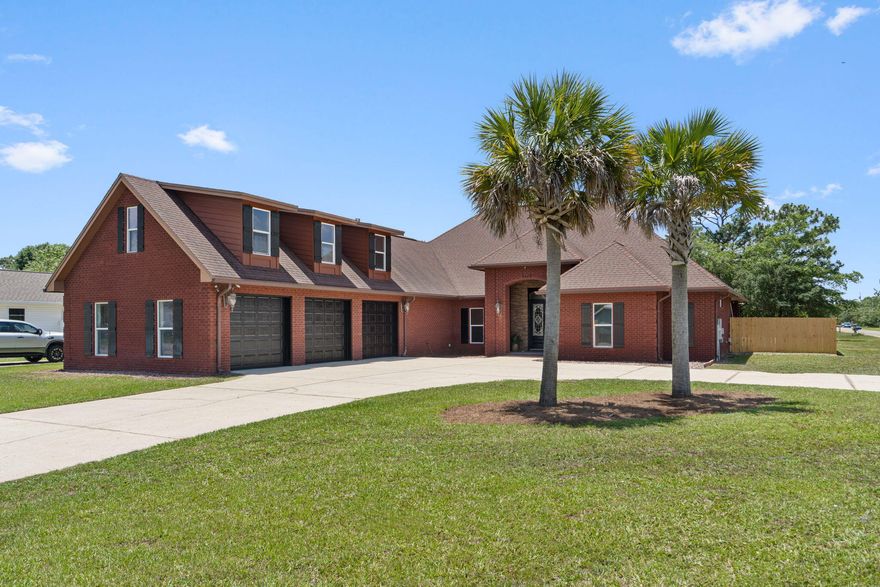 2425 Salamanca St offers approximately 3,000 square feet of fully custom living space on a 1/2-acre corner lot in Navarre. The home features 10-12 foot ceilings throughout and a layout designed for both everyday living and entertaining.

The split-bedroom floor plan places the bedrooms in separate wings of the house, providing privacy and space for family or guests. The open living areas and large outdoor spaces make this home ideal for hosting parties, gatherings, and holidays.

Outside, you'll find a newly installed fully fenced backyard with an inground gunite saltwater pool, included hot tub, and multiple covered outdoor seating areas.

The fully finished 3-car garage includes an installed and operational car lift and a large storage area above the garage with plenty of room to move around and organize.

With an accepted full-price offer, the seller will install a brand-new roof and water heater. 

This property combines custom construction, functional space, and outdoor amenities in a highly desirable Navarre location minutes from the beach with NO HOA!
