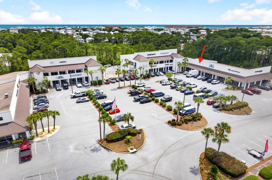 Unit 119 at Holiday Plaza is now available for purchase and offers approximately 1,500 square feet of versatile commercial space in one of Miramar Beach's most established and highly trafficked shopping centers. Currently owner-occupied by a luxury vacation rental management company, the space will be available for occupancy in September 2026. The unit is presently utilized for office, storage, and laundry operations and can easily accommodate a variety of retail, office, service, warehouse, or light commercial uses. Existing utility infrastructure may also make the property attractive for a future laundry operation, although all washers and dryers are excluded from the sale.

The space features durable tile flooring throughout, a remodeled break room, and an updated restroom. A covered rear loading area provides convenient access for deliveries and day-to-day operations, while a lockable covered storage shed offers valuable additional storage space rarely found in comparable units. Holiday Plaza benefits from a strong mix of restaurants, dental offices, salons, professional services, and retail businesses that generate consistent daily traffic throughout the center. The property offers abundant parking, excellent visibility, and convenient ingress and egress directly from Emerald Coast Parkway (US Highway 98). This is a rare opportunity to acquire a well-maintained commercial unit in the heart of Miramar Beach with strong surrounding businesses, excellent accessibility, and flexible future use potential.