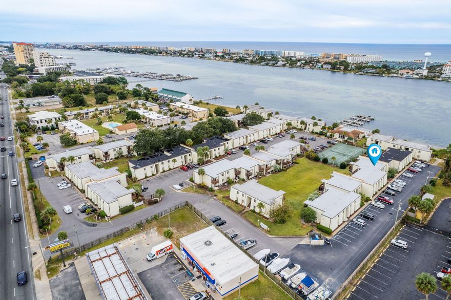 Waterfront local community with no Short Term rentals allowed. Welcome to the Fountainhead Condominium Complex, a picturesque waterfront community located at 308 SW Miracle Strip Parkway in Fort Walton Beach, FL. This charming 1 bed room 1 bathroom bottom floor unit has been refreshed and ready for your  low maintenance costal living. This complex offers an array of exceptional amenities designed for leisure and recreation, making it an ideal place to call home.