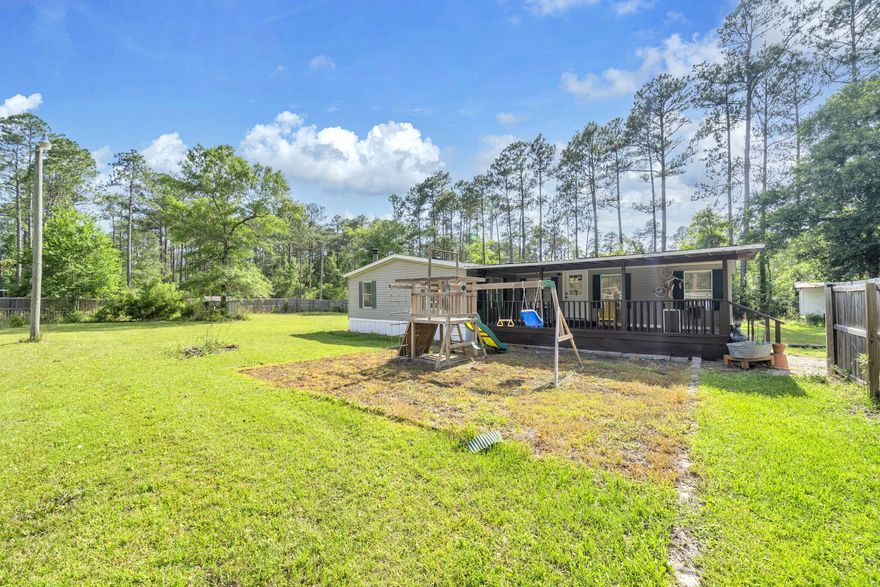 Welcome to the kind of property that's getting harder and harder to find in Freeport. Nearly a full acre of fully fenced land, no HOA, and the freedom to truly enjoy your space without restrictions or extra fees.

Whether you have a boat, RV, work trailers, toys, or simply want room to spread out, this property delivers with double-gate rear access and plenty of usable outdoor space. Privacy and convenience all come together here in one incredible setting.

Location is another major advantage. Skip the Highway 20 traffic and enjoy quick access to everything the Emerald Coast lifestyle has to offer. You're just 5 minutes to Grady Brown Park with bay access, less than 20 minutes to the white sand beaches and shopping of 30A, and only 6 minutes north to Publix, restaurants, gyms, and everyday conveniences.

Inside, this move-in ready 4-bedroom, 2-bath home offers comfortable living with major system updates already completed for peace of mind, including a roof less than one year old, plus updated A/C, water heater, and plumbing all within the past five years. The private well and septic system also help keep monthly utility costs low with no city water bill.

Whether you're searching for a primary residence, a second home, investment opportunity, or even a temporary place to live while building your dream home, this property offers flexibility that is hard to match at this price point.

Properties offering this much land, privacy, freedom, and convenience rarely come available!