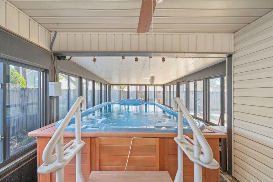 SWIM SPA lifestyle starts HERE. This 3-bedroom, 2-bath home in Willow Bend delivers one of the most unique features in the area--an oversized sunroom built around a swim spa trainer pool, creating a year-round space to relax, exercise, or entertain. Situated on a corner lot, this property also offers RV/boat parking and a functional split floor plan. Inside you'll find a spacious living area with a wood-burning fireplace, wood-look flooring, and a kitchen with solid wood cabinetry and updated appliances. A rare combination of space, flexibility, and standout features--this one is anything but typical! Lucky You!