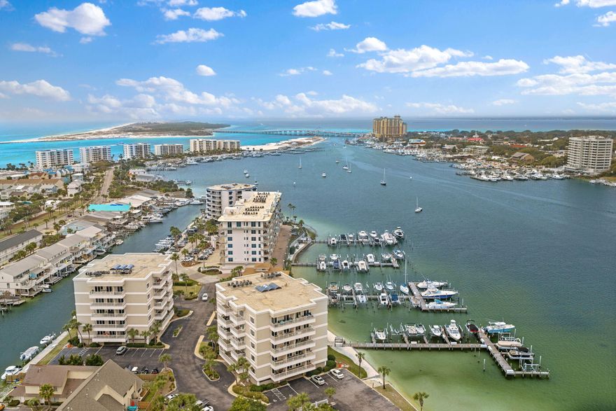 Direct Destin Harbor front Condo with Unobstructed Views & Owner Boat Slips for $50/Month.  Harborfront 2BR/2BA condo at Sun King Towers with unobstructed harbor views from two private balconies.  This waterfront unit offers incredible sunset views and front-row seats to Destin Harbor activity. Enjoy exclusive owner amenities including a harbor front pool, clubhouse, and private marina with boat slips available to owners for just $50/month. Located in the heart of Destin close to Harbor Walk Village, waterfront dining, Crab Island, and the Gulf of Mexico. A rare opportunity for affordable harbor front living with boating access.