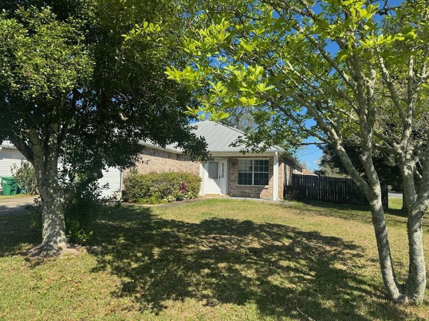 Welcome to this quiet subdivision of Rush Park, tucked off Hwy 98 near Navarre beaches , entertainment district, restaurants and bases. A very nice move in ready 3-bedroom, 2-bath home that sits on a corner lot with a spacious, privacy-fenced backyard, with several gates including a RV/Boat Pad and an outdoor shed.  Enjoy your  gas fireplace in a spacious large living area. The kitchen offers plenty of storage and a separate breakfast nook that opens to the Florida room nice flooring throughout and spacious bedroom.  Great neighborhood with well kept homes.