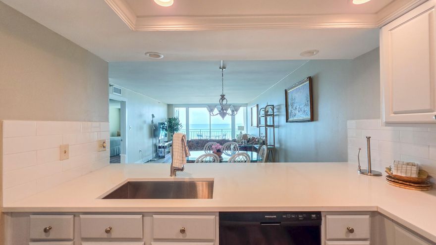 ENJOY GULF-FRONT LIVING in this beautifully situated 4th-floor condo at the Breakers on Okaloosa Island. Featuring 3 spacious bedrooms (GULF FRONT PRIMARY BEDROOM) + REMODELED kitchen and REMODELED 2 full bathrooms, and incredible panoramic views of the gorgeous gulf on your covered balcony. Approximately 1,462 sq. feet.  The living room offers exceptional views of The Gulf with expansive sliding glass doors, leading to your private balcony. The kitchen offers ample cabinetry space, along with new appliances. The Breakers offers resort style amenities, including  two Gulf-side pools, tennis/pickleball courts, shuffle boards, sauna access, fitness center, gas/charcoal grills, gas firepits, BBQ grill area, community association room, and on-site rental management.