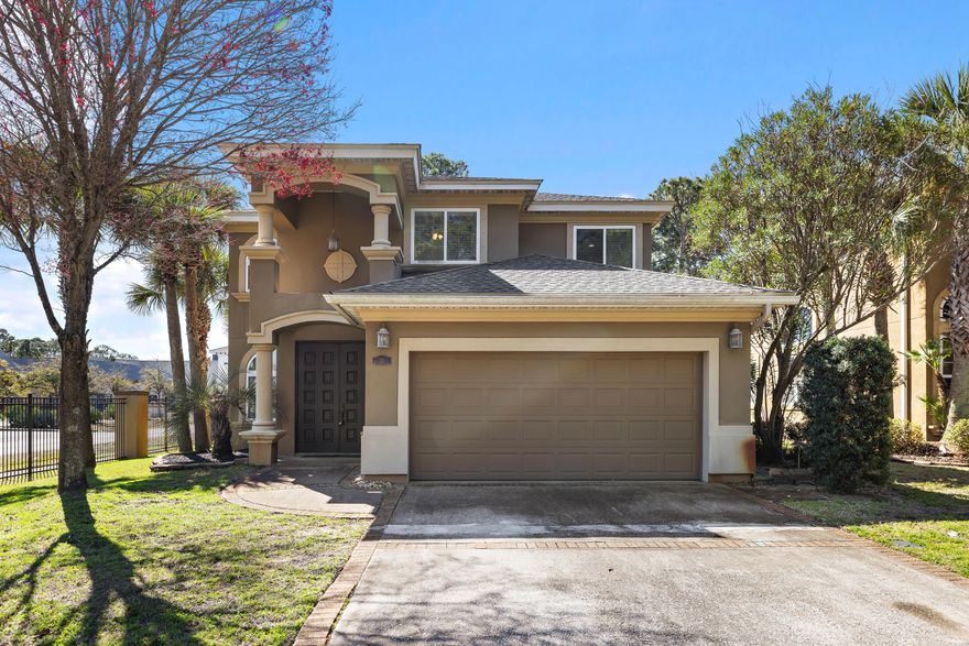 Discover the perfect blend of coastal charm and everyday comfort in this beautifully maintained home located in the desirable Baywalk Landing community of Miramar Beach. Just one mile to the sugar-white sands of the Gulf at the South Walton Beach Access, premier dining, and upscale shopping of the Silver Sands Premium Outlets, this home also offers the rare bonus of being only a short block from the bay and scenic Legion Park.
Built in 2006, this two-story Mediterranean-style residence offers timeless appeal. Inside, you will find thoughtful upgrades throughout, including travertine flooring, rich cherry cabinetry, granite countertops, and stainless steel appliances. The spacious and flexible floor plan is designed for both entertaining and daily living, featuring two living areas, two dining spaces, and an open-concept kitchen that serves as the heart of the home. Upstairs, all four bedrooms provide privacy and comfort, including a generously sized primary suite complete with a spa-like bathroom retreat. And, outside you will enjoy a fully fenced backyard with a covered patio.