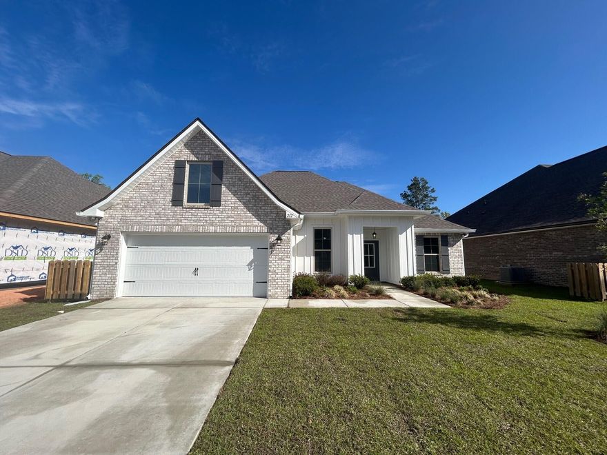 The ROSES V G in Bird Song at Hammock Bay community offers a 3BR/2BA, open and split design with flex space and computer desk/niche. Upgrades added (list attached). Features: double vanity, garden tub, separate custom tiled shower, and 2 walk-in closets in master bath, tray ceiling in master bed, kitchen island, walk-in pantry, covered porches, undermount sinks, crown molding, LED lighting, smart connect WIFI thermostat, framed mirrors in all baths, landscaping package, architectural 30-year shingles, flood lights, and more! Energy Efficient Features: water heater, kitchen appliance package, vinyl low E windows, and more! Energy Star Partner.