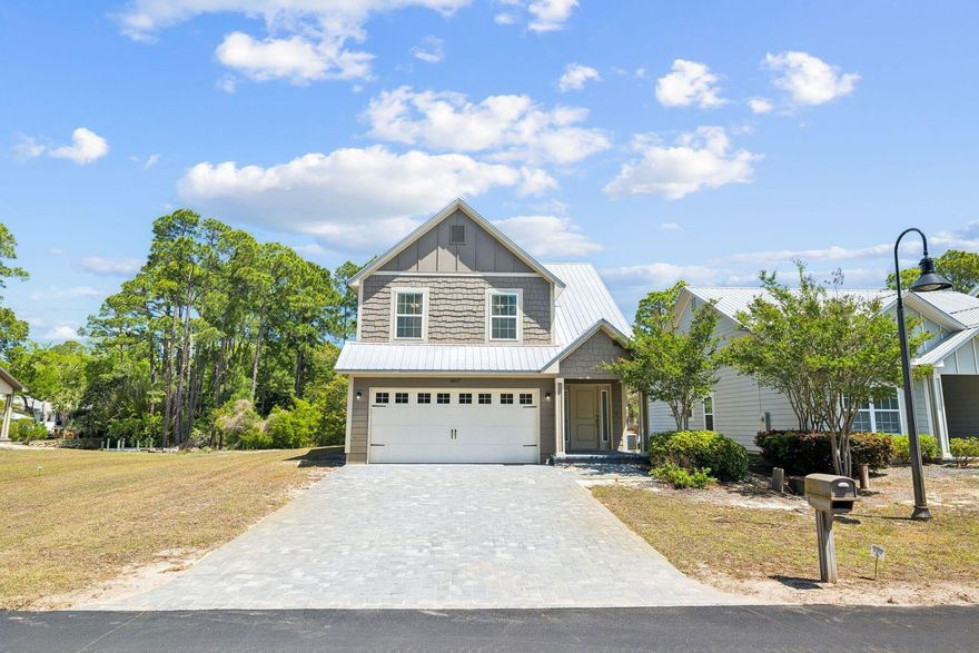 Set along 55 feet of canal frontage in a quiet waterfront setting, this two-story Eagle Bay home offers an easygoing take on coastal living with the added appeal of direct access to Choctawhatchee Bay. Thoughtfully designed for both everyday comfort and time well spent on the water, the residence pairs practical interior spaces with peaceful views and a private dock that makes paddleboarding, fishing, boating, and sunset cruises part of the daily rhythm.
Inside, the open-concept floor plan is oriented to capture the canal from the kitchen, living, and dining areas, creating a natural connection between the home's interior and its waterfront backdrop. Granite countertops, stainless steel appliances, and generous cabinetry give the kitchen a polished, functional feel suited to casual meals and effortless entertaining alike. A covered outdoor living area extends the home's gathering space and offers a comfortable spot to enjoy the breeze and the calm of the canal.
Upstairs, the spacious primary suite serves as a quiet retreat with soothing water views and a relaxed atmosphere at the end of the day. Two full baths and a convenient half bath provide flexibility for family and guests. Ideally located near Highway 98 and just minutes from Scenic Highway 30A beaches, shopping, dining, and outdoor recreation, this canal-front property is well-suited as a primary residence, second home, or investment opportunity.