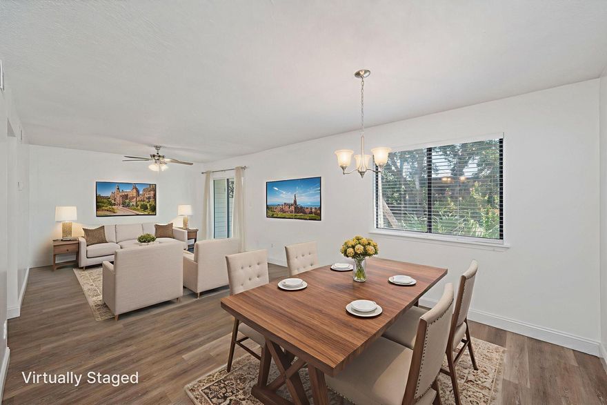 No HOA fee until October 2026 - Discover this beautifully maintained 2-bedroom, 1-bath condo offering 868 square feet of comfortable living. Located on the second floor, this residence features luxury vinyl plank flooring throughout, ceiling fans in the bedrooms and living area, plus a newly installed dishwasher and microwave. New A/C 2025

Enjoy the lifestyle of a waterfront community with amenities that include a sound-front swimming pool,  tennis court, and clubhouse with full kitchen, billiards, and TV lounge. A fishing dock and boat slips are available through the HOA on a first-come, first-serve basis. Water, trash, and sewer are included in the HOA dues, providing added value and convenience. Please note: short-term rentals are not permitted, ensuring a peaceful community.