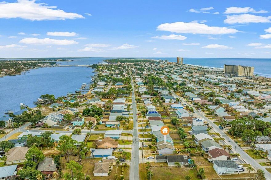 Fully renovated duplex that has generated $107,000 in the past 12 months, just minutes from the beach, offering the perfect blend of lifestyle and investment potential. Located in a highly desirable area, you can walk or golf cart to the white sands & turquoise water beaches, coffee shops, restaurants, and local retail. Just 0.3 miles to a public boat ramp, making it perfect for enjoying both the Gulf and the bay. Each side features 3 bedrooms, 2.5 bathrooms, an open-concept layout, and durable LVP flooring throughout. Both primary suites include spacious private balconies overlooking the fenced backyard, creating an ideal indoor-outdoor retreat. The opportunities are truly endless with this one. Don't miss out!