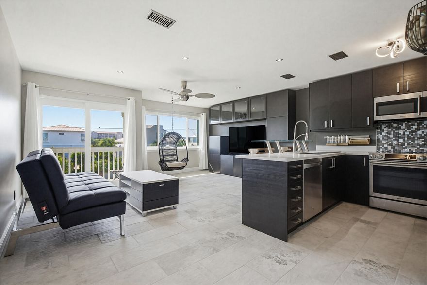 Freshly Painted Interior~Ceiling, Walls, Doors & Trim beautifully updated. Now is Your chance to Snag this Sweet Condo in a Great Location, walk, bike or golf cart to the beach! Superb Destin position, Ideally located near multiple beach access points, including 2 private deeded accesses for your stroll to the sugar-white sands & crystal-clear waters. The exterior was fully made over in 2024, featuring new staircases & a fresh coastal look, while the interior has been tastefully remodeled with sleek, modern finishes. A custom built-in wall of cabinetry in the bedroom maximizes storage and space. With low carrying costs, this property is a smart investment whether you're looking for a short- or long-term rental, or your own full time residence living the saltlife!