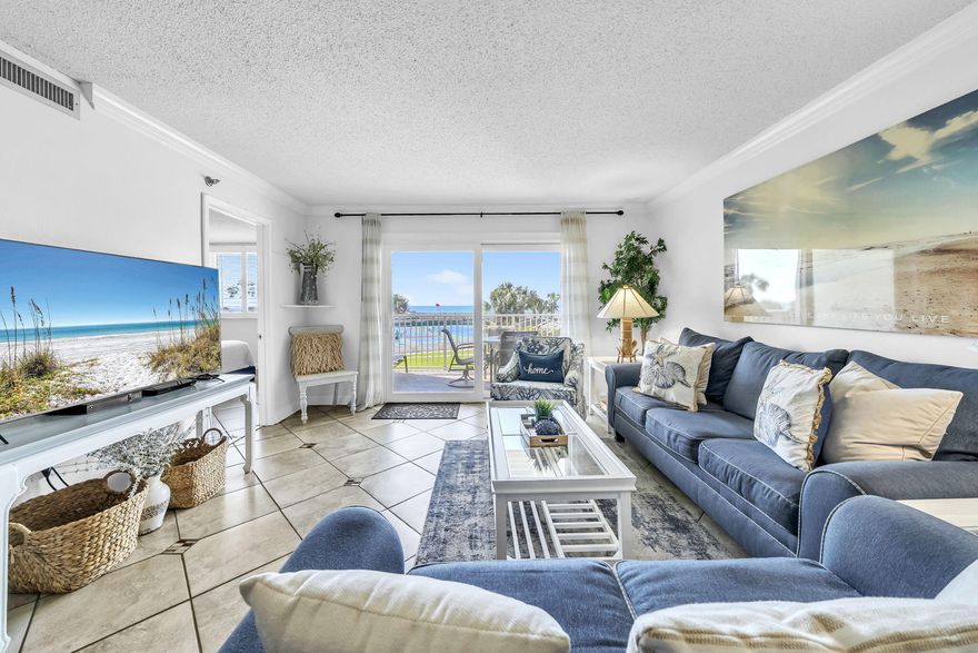 Welcome to Islander 203--an exceptional investment opportunity offering strong rental potential and coastal appeal. This well-maintained unit features a bright, open-concept living and dining area that flows seamlessly onto a private balcony, showcasing gorgeous Gulf views and creating an inviting space for relaxation. The kitchen features white appliances including a new dishwasher as of 2025, ample cabinetry, granite countertops, and a functional layout ideal for short- or long-term stays. Spacious bedrooms provide comfort and privacy, while the primary suite includes a private bathroom with a modern double vanity for added convenience. Positioned in a highly desirable community with deeded beach access, Islander 203 attracts vacationers and seasonal residents alike. Enjoy a full suite  of amenities, including two heated pools, two hot tubs, tennis, pickleball, and basketball courts, a fitness room, and a poolside BBQ pavilion--making this the perfect beach getaway. Whether you're expanding your portfolio or seeking a turnkey income-producing property, Islander 203 delivers the perfect blend of location, views, amenities, and investment potential. Call for a showing today!