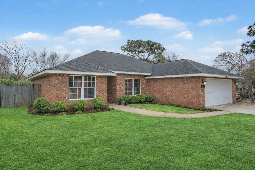 Located just across the county line past Hurlburt Field, this inviting 4-bedroom, 2-bath home offers a spacious open-concept layout designed for comfortable everyday living and easy entertaining. The versatile fourth bedroom can serve as either a guest room or a private office, giving you flexibility to fit your lifestyle. Inside, beautiful hardwood floors flow throughout the main living spaces, complemented by vaulted ceilings that enhance the home's bright and airy feel. Dark wood plantation shutters throughout add both style and privacy. The large breakfast bar opens to the dining area and expansive family room, creating the perfect gathering space. A unique highlight of the home is the oversized movie screen built right into the great room wall--perfect for movie nights, sports, or gaming. Step outside to enjoy the large backyard featuring a covered patio for entertaining, a generous storage shed, and a custom outdoor shower. Conveniently located with quick access to Hurlburt Field and the beautiful beaches of Navarre--and with no HOA--this home offers comfort, character, and coastal convenience.