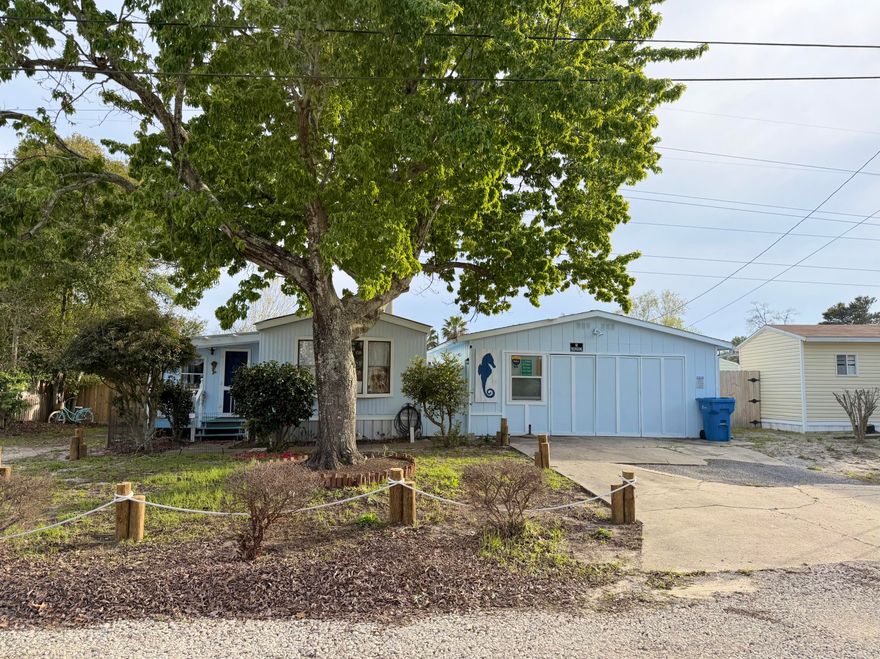 Welcome home! This home offers comfort and great outdoor living - all less than 10 minutes from Pier Park and the beach! The home is already registered as real property, and includes all furnishings! A roof and water heater replaced in 2022 gives peace of mind. Inside, you'll find stainless steel appliances and LVP flooring. Step out back and the property really shines! Enjoy a fully fenced yard, a spacious back deck, and an above-ground saltwater pool - perfect for relaxing or entertaining. The outdoor shower and bar area make it easy to rinse off and unwind. A detached garage and storage shed provide plenty of room for tools, toys, or hobby space. Whether you're looking for a primary residence, beach getaway, or investment opportunity, this property checks all the boxes!