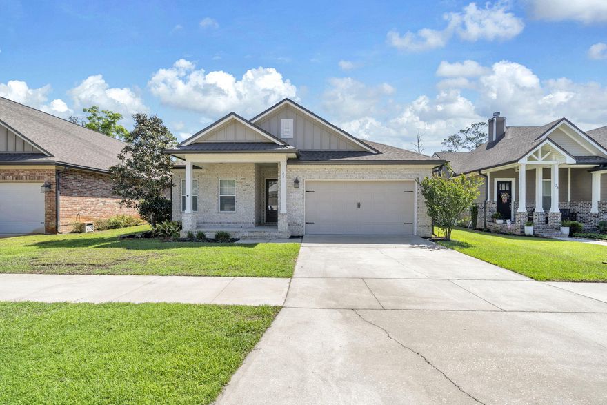 Stunning Randy Wise-built home offers 3 bedrooms, 2.5 bathrooms, office/flex room, and 2,210 square feet of thoughtfully designed living space.  Finishes include 9-foot ceilings, 8-foot doors, crown molding, cased openings and windows, an oil-rubbed bronze hardware package, LED lighting and laminate, tile, and carpeted flooring in the bedrooms. The kitchen features stainless steel appliances, quartz countertops, soft-close drawers and cabinets, extended island with a breakfast bar-perfect for entertaining. Spacious master suite includes a beautifully tiled shower, whirlpool tub, double vanity, tiled deck, and a large walk-in closet. The laundry room offers both upper and lower cabinetry.  Large large covered and screened rear porch that backs up to a private wooded preserve.  MUST SEE!