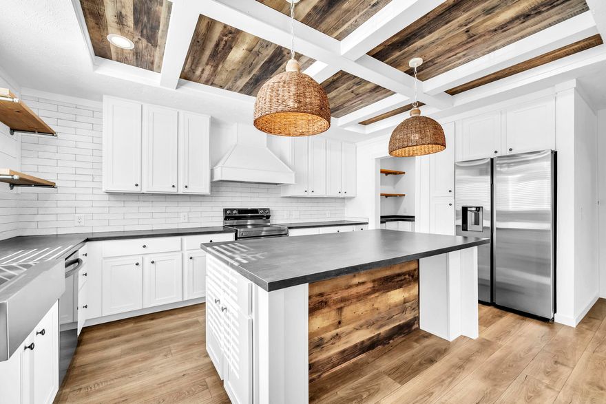 Fresh, coastal, and perfectly placed, this brand-new Point Washington home blends relaxed style with smart design. Inside, you'll find an open kitchen, butler's pantry, mudroom, and and  oversized primary suite.
With no HOA, bay access nearby, and quick trips to Grayton Beach and Thirty-A, the location seals the deal. The vacant lot next door is also available for purchase.