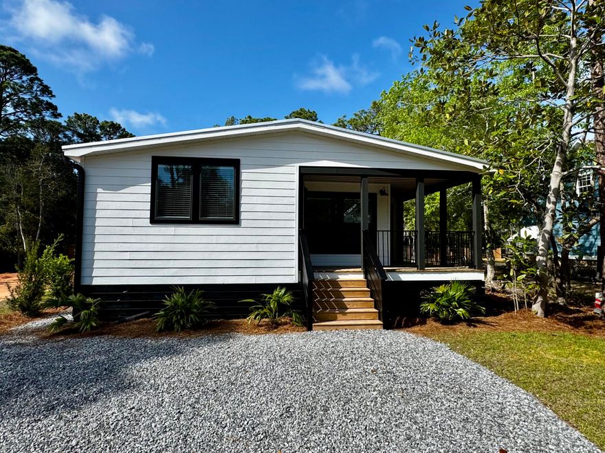 Fresh, coastal, and perfectly placed, this brand-new Point Washington home blends relaxed style with smart design. Inside, you'll find an open kitchen, butler's pantry, mudroom, and and  oversized primary suite.
With no HOA, bay access nearby, and quick trips to Grayton Beach and Thirty-A, the location seals the deal. The vacant lot next door is also available for purchase.