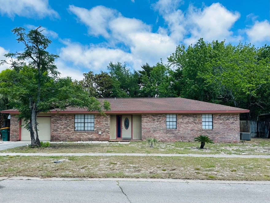 Located in the Heart of Destin! 3 Bedroom, 2 bath with office and garage. Roof replaced 2007.  AC replace 2023, Electrical box upgrade to Copper Wiring 2007, Large fenced back yard.  PROPERTY TO BE SOLD ''AS IS''.