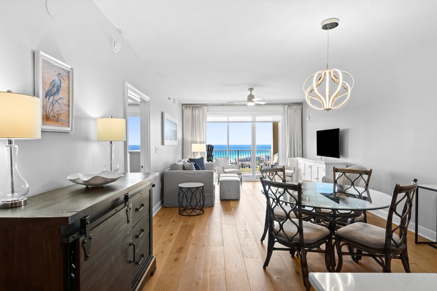 Welcome to an exceptional coastal retreat in Miramar Beach, where refined comfort meets breathtaking natural beauty. This fully furnished, turnkey 2-bedroom, 2-bath condo spans 1,175 square feet inside and offers an effortless blend of sophistication and relaxed Gulf-front living.

From your private, oversized balcony, indulge in sweeping panoramic views of the emerald Gulf waters, sugar-white sand beaches, and tranquil lake--an extraordinary setting for both sunrise serenity and unforgettable sunsets. Inside, the home is bathed in natural light, showcasing a bright, coastal-inspired design with upgraded wood flooring and thoughtfully curated furnishings throughout.

The kitchen is both stylish and functional, featuring stainless steel appliances (2021), elegant quartz countertops, and modern finishes. Each bedroom serves as a private sanctuary with its own en-suite bath, fully remodeled with spacious walk-in showers. The primary suite offers direct balcony access, creating a seamless indoor-outdoor living experience.

Recent enhancements include a newer HVAC system, water heater, updated lighting, and fresh interior paint--ensuring both comfort and peace of mind. A full-size washer and dryer add everyday convenience.

Set within an exclusive 300-acre resort community, residents enjoy access to over 2,000 feet of private beach, multiple pools, tennis courts, lush landscaped grounds, serene lakes, and a championship golf course--delivering a truly elevated coastal lifestyle.

Lovingly maintained as a full-time residence by its current owners, this property presents in exceptional condition and stands apart from typical investment units. While previously utilized as a rental, it has been meticulously cared for in recent years and is offered fully furnished for immediate enjoyment or income potential.

This is more than a condo--it's a lifestyle of luxury, tranquility, and effortless elegance along the Emerald Coast.