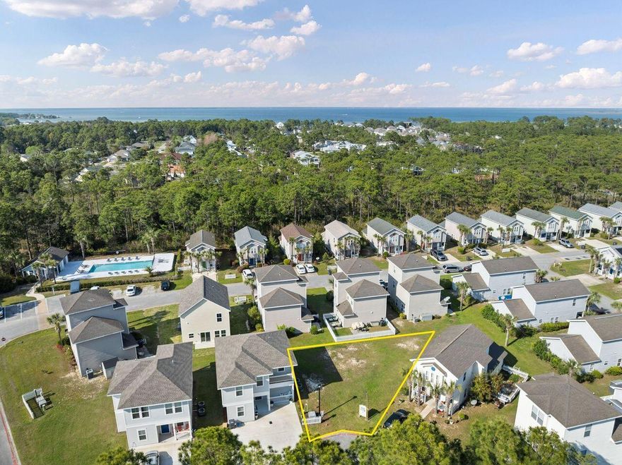 Best priced buildable lot in Flood Zone X in Santa Rosa Beach, perfectly positioned within the established Enchanted Estates Community on a quiet cul-de-sac. This homesite offers added privacy & minimal traffic, perfect for enjoying a peaceful, laid-back lifestyle. Tucked within a welcoming neighborhood, enjoy access to a gated community pool complete with a charming pool house, all bordered by preserved state forest to the north providing a serene, natural backdrop.

This lot purchase includes HOA-approved house plans, offering a streamlined path to building your ideal home with confidence and ease when timing is right. From this prime location, you're just minutes from the sugar-white sands & emerald waters of Walton County's renowned beaches, as well as the scenic beauty and outdoor adventures along 30A and nearby Topsail Hill Preserve State Park. To the west, enjoy dining, shopping, and entertainment at Grand Boulevard, Sandestin Resort, and Silver Sands Premium Outlets. Everyday conveniences are close by, including Publix, Van R. Butler Elementary School, and Ascension Sacred Heart Hospital.

Whether you're envisioning a full-time residence or a relaxing getaway, this property places you right in the heart of it all.