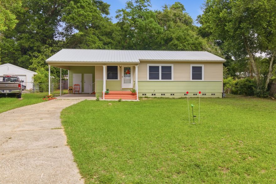 Welcome home to this charming, fully updated 3-bedroom, 1-bathroom retreat nestled in the heart of Pensacola. Compact, efficient, and completely move-in ready at 864 sq. ft., this one checks every box. Sunlight pours through large, expansive windows, brightening every corner of the freshly painted interior, while the fully renovated kitchen steals the show with gorgeous granite countertops, brand-new stainless steel appliances, and sleek modern finishes. The big ticket items are already taken care of -- a new AC installed in 2024, a durable metal roof replaced in 2014, a gas connection on site, and a covered carport to keep your vehicle out of the elements. Outside, you'll find generous curb appeal sitting on a spacious 0.27-acre lot with a large front yard and a fully fenced backyard perfect for pets, entertaining, or weekend cookouts. Tucked away on a dead end road, you'll enjoy the peace and quiet of no through traffic while still being incredibly close to everything. Situated right off Navy Blvd, you're just 7 minutes from two Aldi locations, 9 minutes to Publix, 10 minutes to Walmart, 14 minutes from the vibrant energy of Downtown Pensacola, and 9 minutes from the nearest Emergency Room. Schedule your showing today -- this one won't last long.