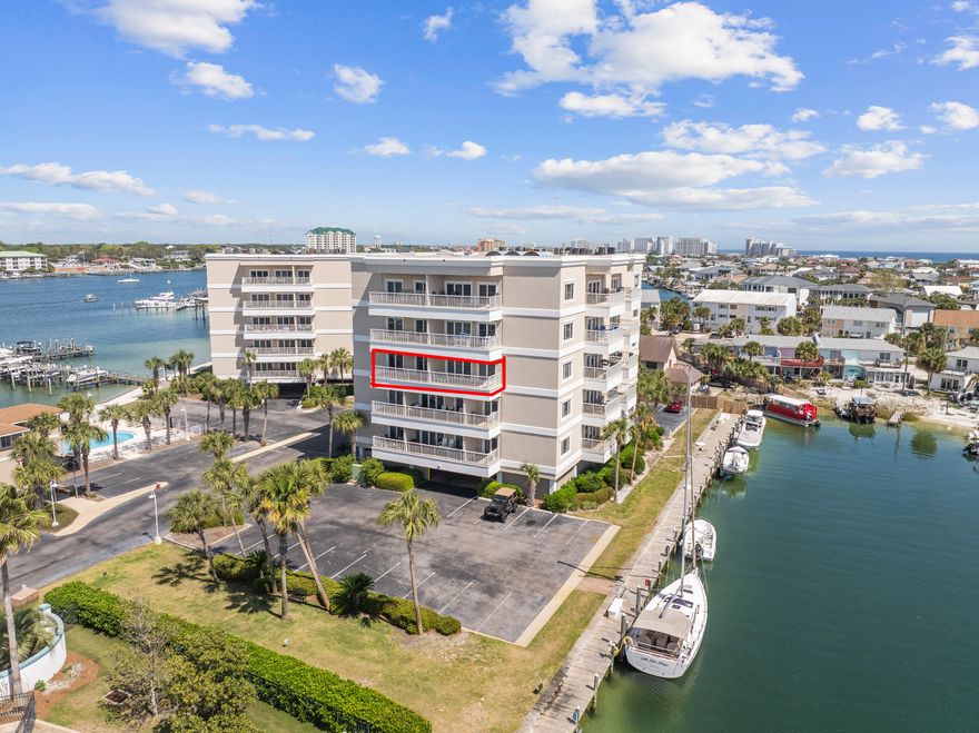 Wake up to breathtaking harbor views and experience the best of waterfront living in this beautifully maintained 2-bedroom, 1-bath condominium in the gated community of Sun King Towers, perfectly situated along the scenic harbor on Holiday Isle.  This move-in ready coastal retreat is being sold fully furnished, making it truly turnkey and ready for immediate enjoyment. Recent updates include a new refrigerator, new ice maker, and a beautifully remodeled bathroom, adding fresh style and convenience to this inviting harbor-front residence. Large windows capture the vibrant harbor scenery, creating a relaxing backdrop for everyday living or a peaceful getaway. Residents of Sun King enjoy a variety of amenities designed for the ultimate coastal lifestyle, including a harbor-front community pool, clubhouse and community room for gatherings, an outdoor entertainment area perfect for watching Destin's famous harbor fireworks, and a highly coveted private marina.  

Boat slips are available on a first-come, first-served basis, allowing you to enjoy boating on the harbor without the expense of purchasing a private slip--a rare and valuable opportunity for boating enthusiasts.    

Located just minutes from the sugar-white sands of the Gulf, you're only a short stroll or bike ride to the beach. When you want to explore the harbor without driving, simply call the Destin Water Taxi to transport you to nearby restaurants, shopping, and entertainment throughout Destin.

With short-term rentals not permitted, Sun King offers a peaceful and well-maintained residential environment--perfect for a primary residence, second home, or relaxing waterfront retreat.

If you've been searching for a furnished harbor-front condo with boating access, beautiful views, and a prime Holiday Isle location, this is an opportunity you won't want to miss.