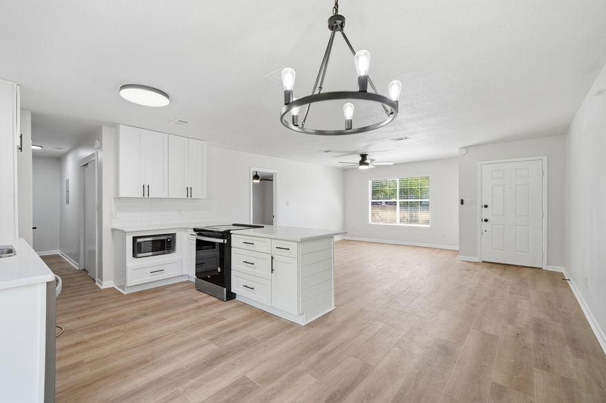 Location, Location! Updated 3 bedroom, 2 bath, 1,200 sq. ft. home in the heart of Valparaiso -- just 0.4 miles (an easy 8-10 minute walk) to Lincoln Park.
This home is 100% updated and move-in ready, featuring:
New AC,2009 Metal Roof, 2016 Hot Water Heater,New Kitchen with granite countertops & stainless steel appliances
Fresh Interior & Exterior Paint
Newly Stained Wraparound Deck
Updated Bathrooms
New Flooring Throughout -- No Carpet
New Fans & Lighting. 
Two boat ramps within walking distance,
Four ramps within a 5-minute drive,
Direct access to Tom's Bayou, Boggy Bayou, and Choctawhatchee Bay,
Ideal for boating, kayaking, fishing, and military buyers stationed at Eglin
Perfect location close to parks, schools, Eglin AFB, and everything Valparaiso offers.