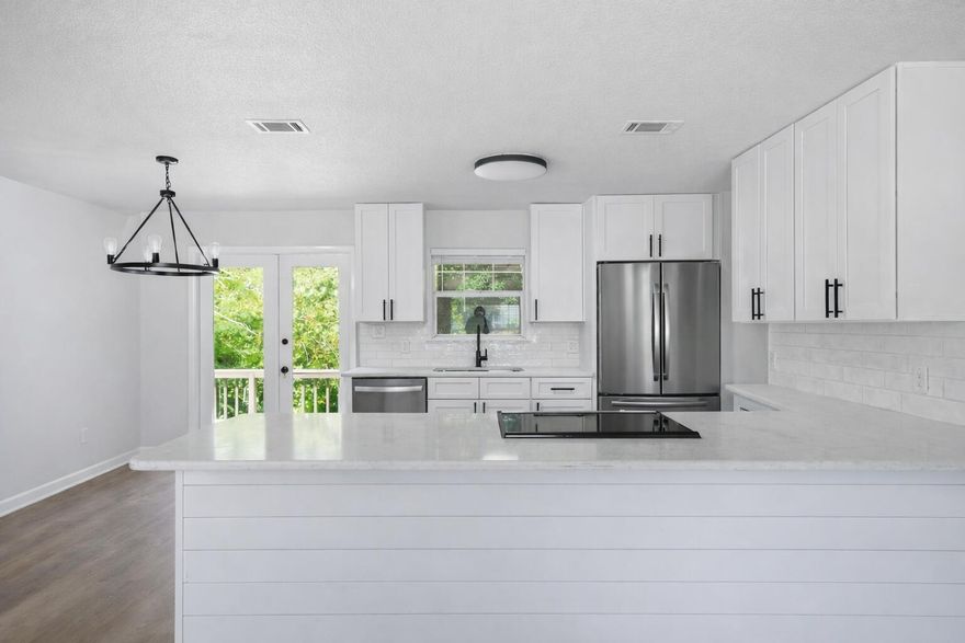 Location, Location! Updated 3 bedroom, 2 bath, 1,200 sq. ft. home in the heart of Valparaiso -- just 0.4 miles (an easy 8-10 minute walk) to Lincoln Park.
This home is 100% updated and move-in ready, featuring:
New AC,2009 Metal Roof, New Hot Water Heater,New Kitchen with granite countertops & stainless steel appliances
Fresh Interior & Exterior Paint
Newly Stained Wraparound Deck
Updated Bathrooms
New Flooring Throughout -- No Carpet
New Fans & Lighting. 
Two boat ramps within walking distance,
Four ramps within a 5-minute drive,
Direct access to Tom's Bayou, Boggy Bayou, and Choctawhatchee Bay,
Ideal for boating, kayaking, fishing, and military buyers stationed at Eglin
Perfect location close to parks, schools, Eglin AFB, and everything Valparaiso offers.