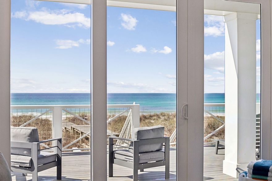 Wake up to uninterrupted Gulf of Mexico views, step onto your private balcony, and hear nothing but waves. 16525 Front Beach Road is a fully furnished, turnkey beachfront home offering 50 feet of pristine Gulf frontage, its own beach walkover right out the back door over the dune, a heated pool, and rental projections of $359,000 annually with accommodations for up to 22 guests. Whether you're seeking a high-performing vacation rental on the Emerald Coast or a legacy Gulf front family retreat, this property delivers on every level.
Maintained in like-new condition and offered fully furnished, this Gulf front home is move-in ready. With strong rental projections and capacity for large groups, it presents a compelling opportunity for investors seeking a premier beachfront vacation rental on  the Emerald Coast. Designed to maximize Gulf views, the home features three expansive balconies connected by a spiral staircase, creating multiple outdoor living spaces with panoramic water views. Two Gulf-facing bedrooms open directly to their own balconies, letting guests wake up to the sound of waves and unobstructed views of the Gulf of Mexico.
The second floor serves as the main living level, where an open-concept kitchen, dining, and living area flows seamlessly to a large balcony overlooking the beach. The kitchen is built for entertaining, featuring quartz countertops, custom cabinetry, a tile backsplash, a large island with seating for six, gas range, built-in ice maker, and double sinks.
The first floor is designed for gathering and recreation, with a bunk room and recreation room that opens directly to the heated pool area. A built-in bar with ice maker and beverage refrigerator creates the perfect setup for poolside entertaining after a day on the beach.
The primary suite offers Gulf views, a balcony, walk-in closet, double vanity, garden tub, and separate shower. Throughout the home you'll find shiplap accent walls, ensuite bathrooms in every bedroom, generous owner storage closets on each floor, and integrated WiFi extenders with indoor and outdoor speakers.
Outside, a beach walkover, outdoor shower, Polywood outdoor furniture, and abundant parking round out a package that is rarely found in Gulf front homes. Positioned on a quiet stretch of beach with no nearby public walkovers, the shoreline here stays uncrowded, giving guests the feel of a private beach just steps from the door, while still being just minutes from Pier Park's restaurants, shopping, and entertainment.
16525 Front Beach Road is a rare Gulf front home where luxury amenities, an unbeatable location, and exceptional vacation rental income potential come together in one standout beachfront property.