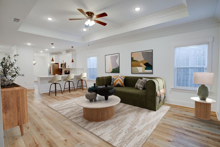 Step inside and feel an immediate sense of ease. This practically brand-new 2023 Grand American Enterprises home has been thoughtfully cared for and is truly move-in ready, offering the peace of mind that comes with quality construction and modern finishes.

As you enter, the open-concept layout unfolds naturally in front of you. Sunlight fills the living area, bouncing off the clean lines, soft tones, and Luxury Vinyl Plank flooring that extends throughout the home ensuring a seamless, carpet-free flow from room to room. From the moment you arrive, this space feels refreshing and uplifting. The heart of the home, the kitchen, invites you in with elegant quartz countertops, stainless steel appliances, and a layout that effortlessly connects to the living and dining spaces. Standing here, you can feel how the openness encourages gathering and movement while still offering the calm, airy atmosphere that makes everyday moments feel special.
Continue through the home and you'll notice how the natural light follows you. The added window treatments provide both beauty and privacy, allowing you to adjust the ambience to match your mood throughout the day. Each bedroom continues the experience of openness and comfort, creating spaces that feel peaceful and easy to personalize.
Both bathrooms have been enhanced with upgraded medicine cabinets, offering extra storage and function without sacrificing style, another thoughtful touch that makes living here feel simple and streamlined.
Step into the backyard, and the sense of openness continues. Whether you envision morning coffee, evening unwinding, or weekend projects, the outdoor space feels like an extension of the home's bright and calming interior.
From the modern finishes to the natural light and airy atmosphere, 1522 27th Street offers a living experience that feels fresh, inviting, and instantly comfortable, ready to welcome you the moment you arrive.